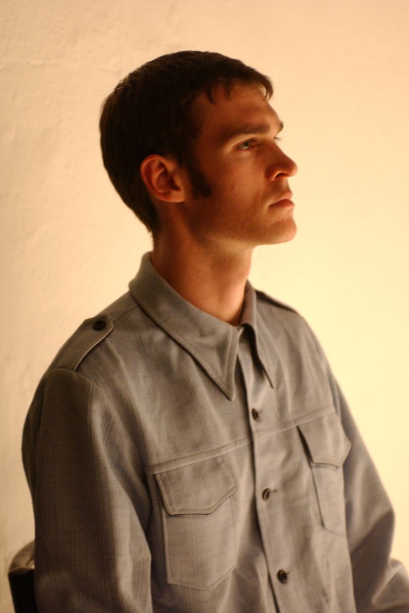 Eyolf, played by a very tall actor, is watching what is likely to be the events following his death.